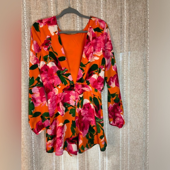 Lulu’s Sweetest Song Orange and Pink Floral Print Backless Long Sleeve Romper. - Picture 4 of 10